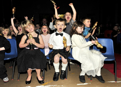 Starry eyed: Oscars award winners in the audience at the 'Oscars' school awards ceremony