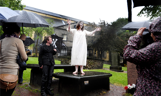 The resident ghost remonstrates with a tourguide at Greyfriars Kirk churchyard The resident ghost remonstrates with a tourguide at Greyfriars Kirk churchyard