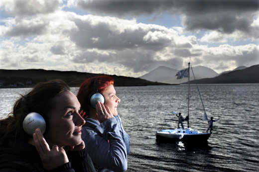 Walkers listen in to mini-broadcasts from the Celestial Radio yacht in Portree harbour Walkers listen in to mini-broadcasts from the Celestial Radio yacht in Portree harbour