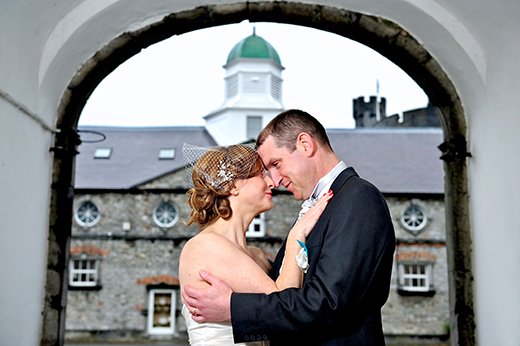 post-wedding in an archway at Kilkenny Design Centre