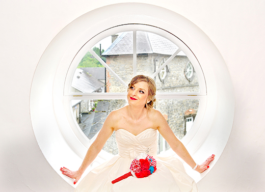 A circular window at the Design Centre makes for a natural frame to picture the bride