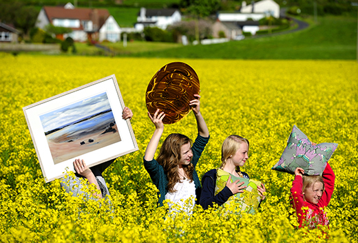 The Ross family from Dumfries with a 'haul' of art from Spring Fling open studios