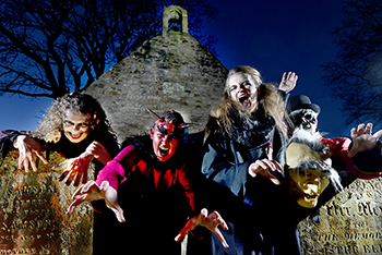 Ayrshire Opera performers perform in the Auld Kirk Graveyard, Alloway, as part of Ae Spark O' Nature's Fire - a tribute to Robert Burns