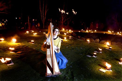 Ayrshire Opera harpist Esther Swift performs surrounded by fire torches at Ae Spark O' Nature's Fire - a festival in tribute to Robert Burns Ayrshire Opera harpist Esther Swift performs surrounded by fire torches at Ae Spark O' Nature's Fire - a festival in tribute to Robert Burns